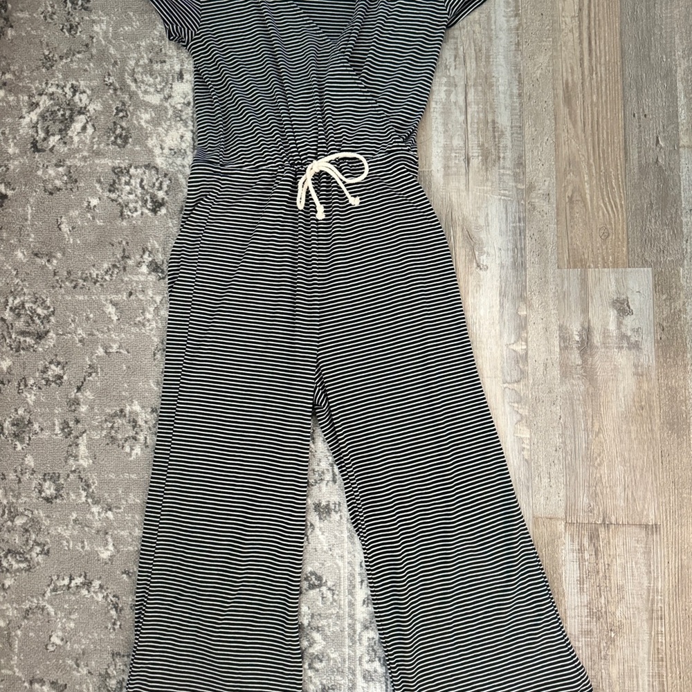 Black and white striped jumpsuit. Size small